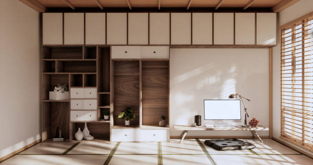 istock Living room interior on tatami mat floor, computer on low table and pillow.3D rendering 1409498084