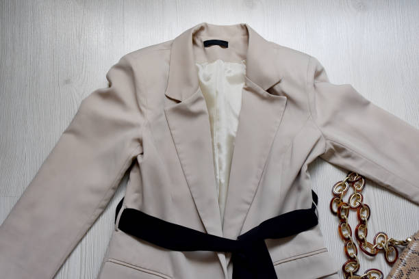 Womenswear jacket and purse, women’s fashionable clothing jacket and accessory