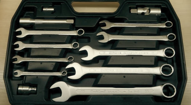 istock Open wrenches and spanners kit in black case 1409502100