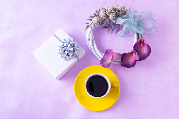 istock purple Calla lily Wreath and coffee and Present 1409505761