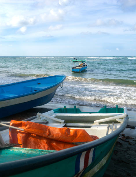 istock boats on the beach 1409506310