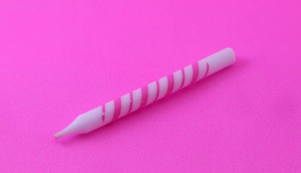 istock One pink and white birthday candle 1409507230