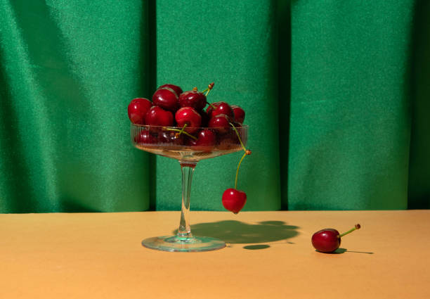 istock Cherry fruit in Art Deco cocktail glass. 1409511641