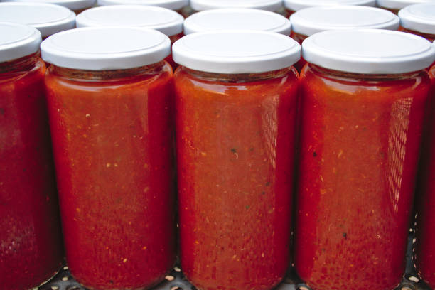 istock Homemade tomato canning jars. 1409512203