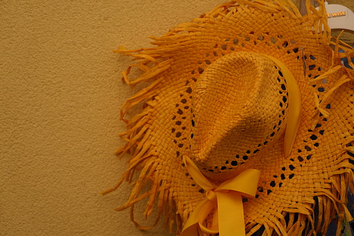 Mexican background. Sombrero and maracas on rustic wooden background. Top view with copy space