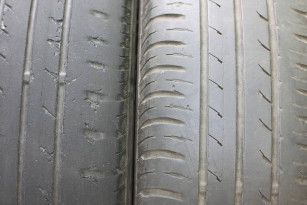 Old summer tires with various damages Old summer tires with various damages closeup rubber rocks stock pictures, royalty-free photos & images