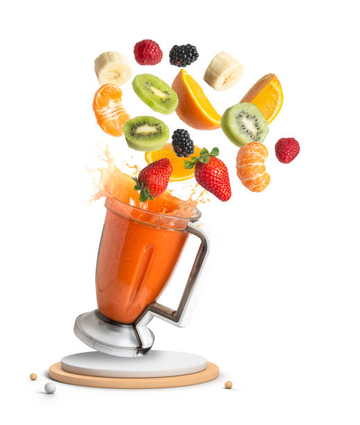 istock Fruits falling into a blender with fruit juice on a podium 1409516223