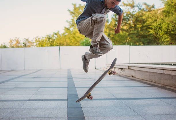 istock Young man jumping with his skateboard 1409528686