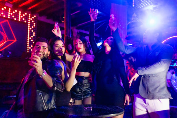 istock Group of friends at a party 1409529492