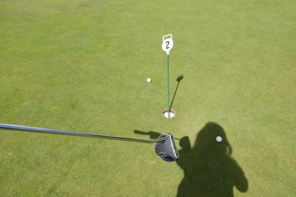 istock Golf game on the green field. 1409531037