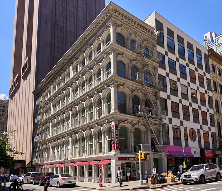 New York, NY - June 29, 2022: 319 Broadway (1870) is  5-story Italianate cast-iron building on Thomas St and Broadway in Tribeca, NYC. It is the lone survivor of a pair of buildings at 317 and 319 which were known as the \