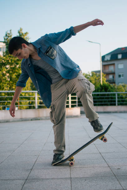 istock Young man skating in the city 1409532821