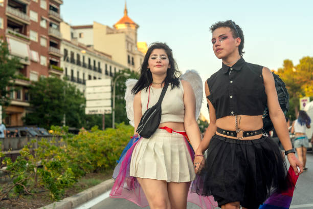 An LGBT couple at Madrid Pride stock photo