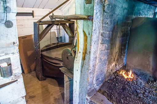 Firepit and bellows in blacksmith shop