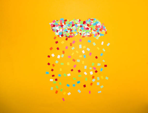 istock colorful cloud with colorful precipitation, creative rain, modern art design, minimal concept on yellow background 1409540612