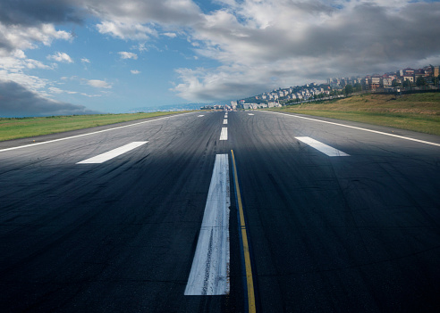 Empty runway strip with markings.