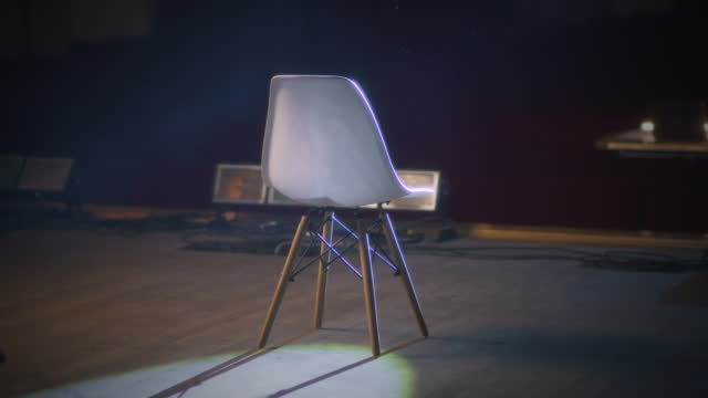 Chair on the stage in an empty theater