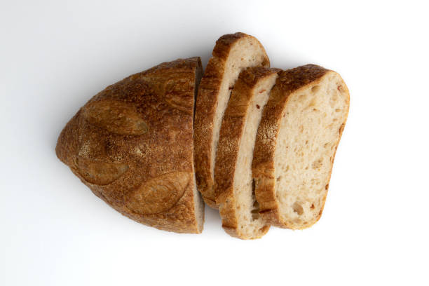 istock fresh homemade bread on white background, top view 1409556573