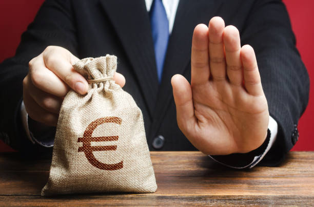 Businessman refuses to give European euro EUR money bag. Refusal to grant loan mortgage, bad credit history. Refuses cooperate. Financial difficulties. Economic sanctions, confiscation funds Businessman refuses to give European euro EUR money bag. Refusal to grant loan mortgage, bad credit history. Refuses cooperate. Financial difficulties. Economic sanctions, confiscation funds refusing stock pictures, royalty-free photos & images