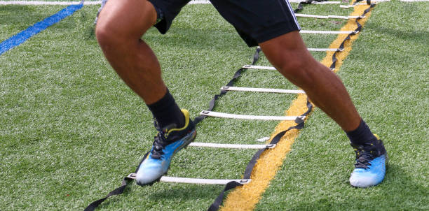 istock Football player summer training with ladder drill 1409562066