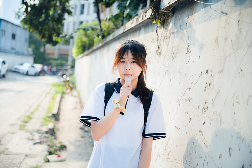 Asian girls eating ice cream