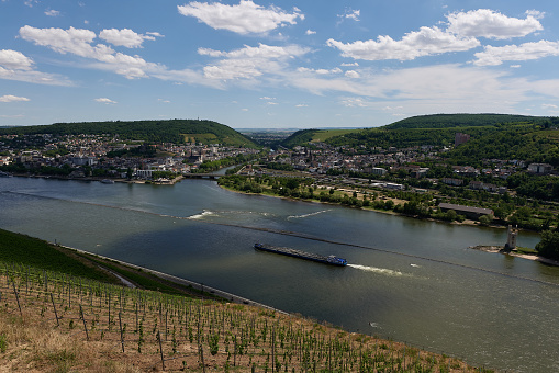 A view of Bingen am Rhein, Germany from the hiking trail as the sun just illuminates the valley on a fine day