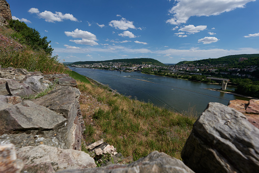 A view of Bingen am Rhein, Germany from the hiking trail as the sun just illuminates the valley on a fine day