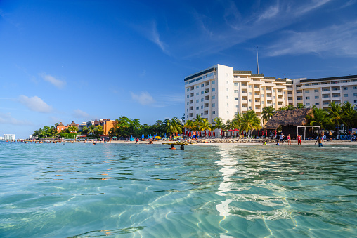 Ripple in the water near hotel on the sandy beach in Cancun, Yukatan, Mexico.