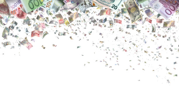Large group of various global paper currencies falling from sky stock photo