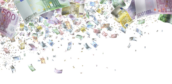 Large group of various paper currencies falling from sky