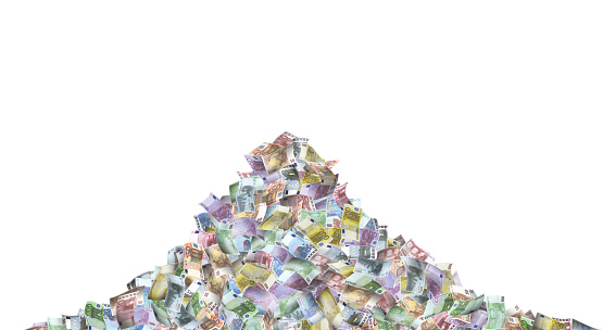 Large group of paper currencies pile over white background