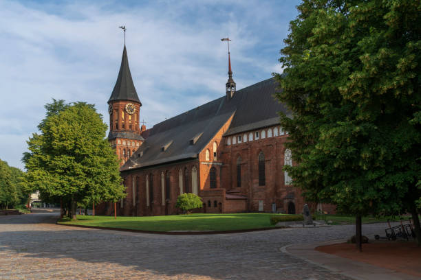 View of the Koningberg Cathedral on Immanuel Kant Island on a sunny summer day, Kaliningrad, Russia View of the Koningberg Cathedral on Immanuel Kant Island on a sunny summer day, Kaliningrad, Russia immanuel stock pictures, royalty-free photos & images