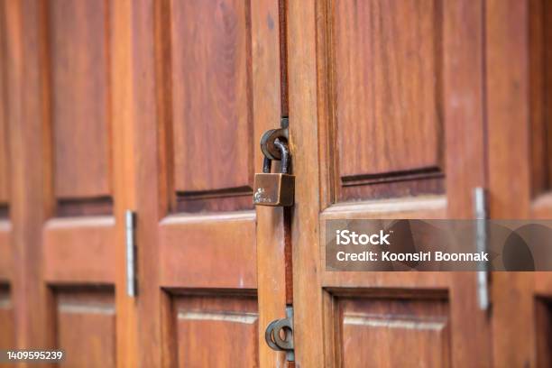 Lock On The Door Of An Old Farmhouse Locked Wooden Door Stock Photo - Download Image Now