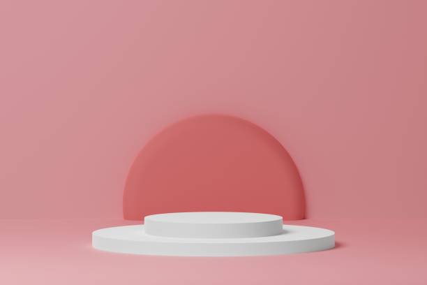 istock White podium cylinder shape on pink background. Product showcase display. 3d rendering 1409595598