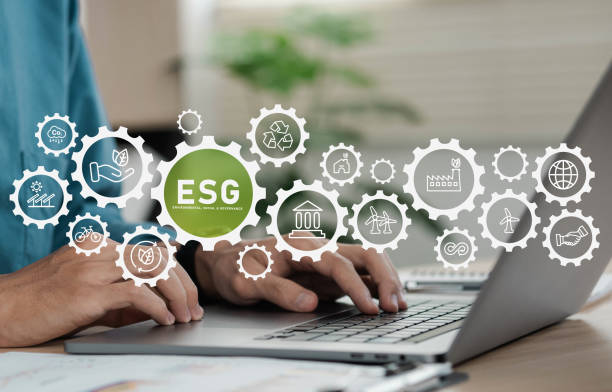 istock Businessman using computers for environment, society and governance. ESG icon concept in sustainable and ethical business on gimmicks, networked on background. 1409596432