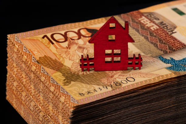 istock symbolic miniature house 1409596766