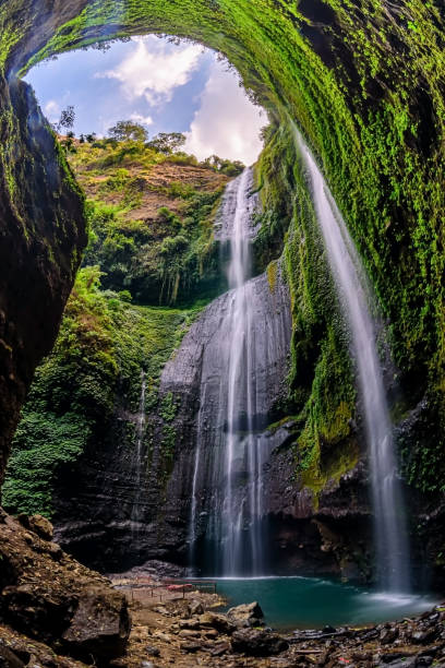 istock Madakaripura Waterfall (Probolinggo) is the tallest waterfall in deep Forest in East Java, Indonesia. 1409597891