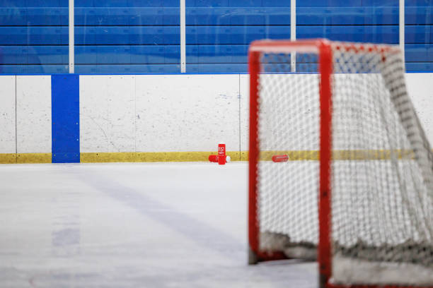istock Hockey net with water bottles in background 1409598007