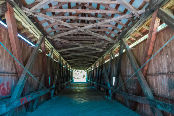 istock Old Covered Wooden Bridge 1409601339