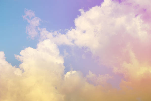istock Abstract colorful clouds background pastel color on bright blue sky for graphic presentation and advertising backdrop. 1409601347