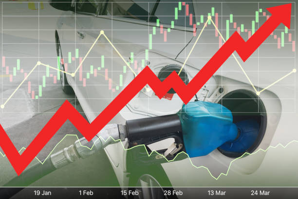 istock Stock index financial data diagram with big red arrow up, graph, chart and candlesticks on image of filling up the white car gas tank for energy industrial and business background. 1409601901