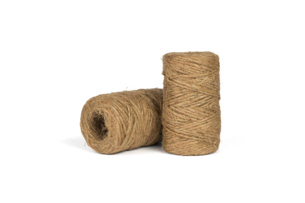 istock Two large skeins with coarse thread isolated on a white background. 1409605403