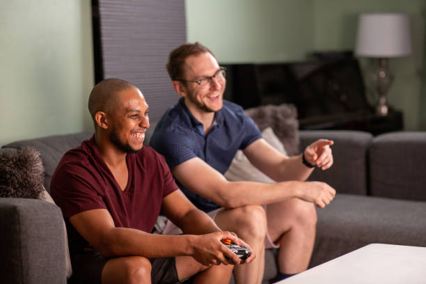 istock Two Guys Playing Video Games 1409605915