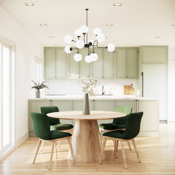 istock Modern kitchen room interior design and decoration with built in light green counter and cabinet, wooden dining table and dark green chairs, wooden parquet floor. 3d rendering kitchen 1409606623