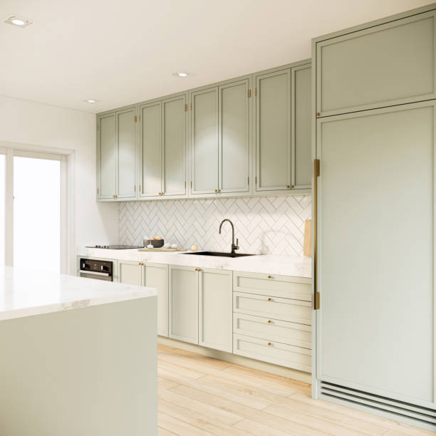 istock 3d rendering built in modern light green color kitchen counter and cabinet interior design and decoration with mable top island, wooden parquet floor. 1409606638