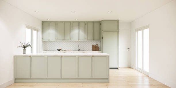 istock 3d rendering modern mock up kitchen room interior design and decoration with light green built in counter and cabinet wooden parquet floor and sunlight from window. 1409606648