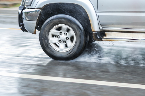 Driving under wet road conditions,Road accident that occurred One reason is that it occurs during the rain, slippery roads,blur,Soft focus,selective focus.