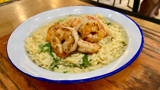 istock Shrimp risoni pasta Italian dish meal 1409608251