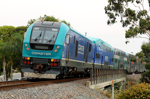 Oceanside, California, USA - July 16, 2022: COASTER Commuter Train - Downtown Encinitas.\n\nCOASTER Commuter Train is operated by the North County Transit District (NCTD) between Oceanside Transportation Center and San Diego Santa Fe Depot.