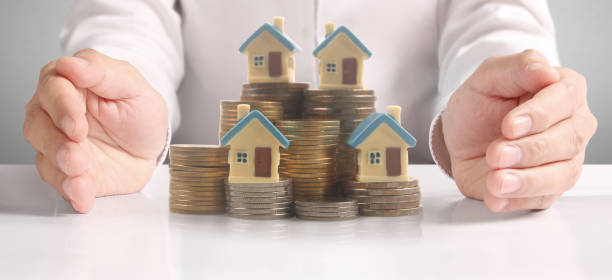istock House Residential Structure in  hand 1409613636